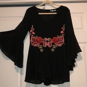 Black romper with rose design